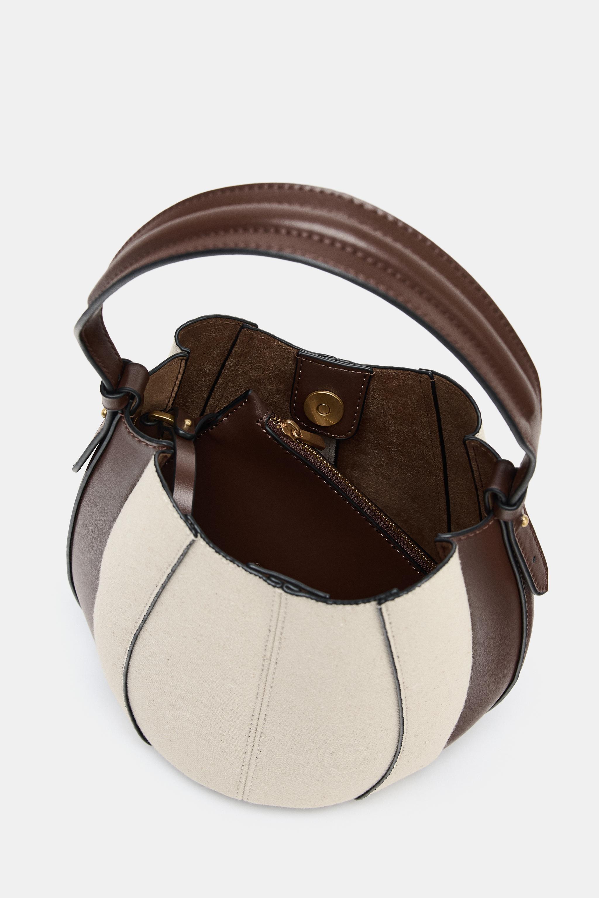 TOPSTITCHED BUCKET BAG